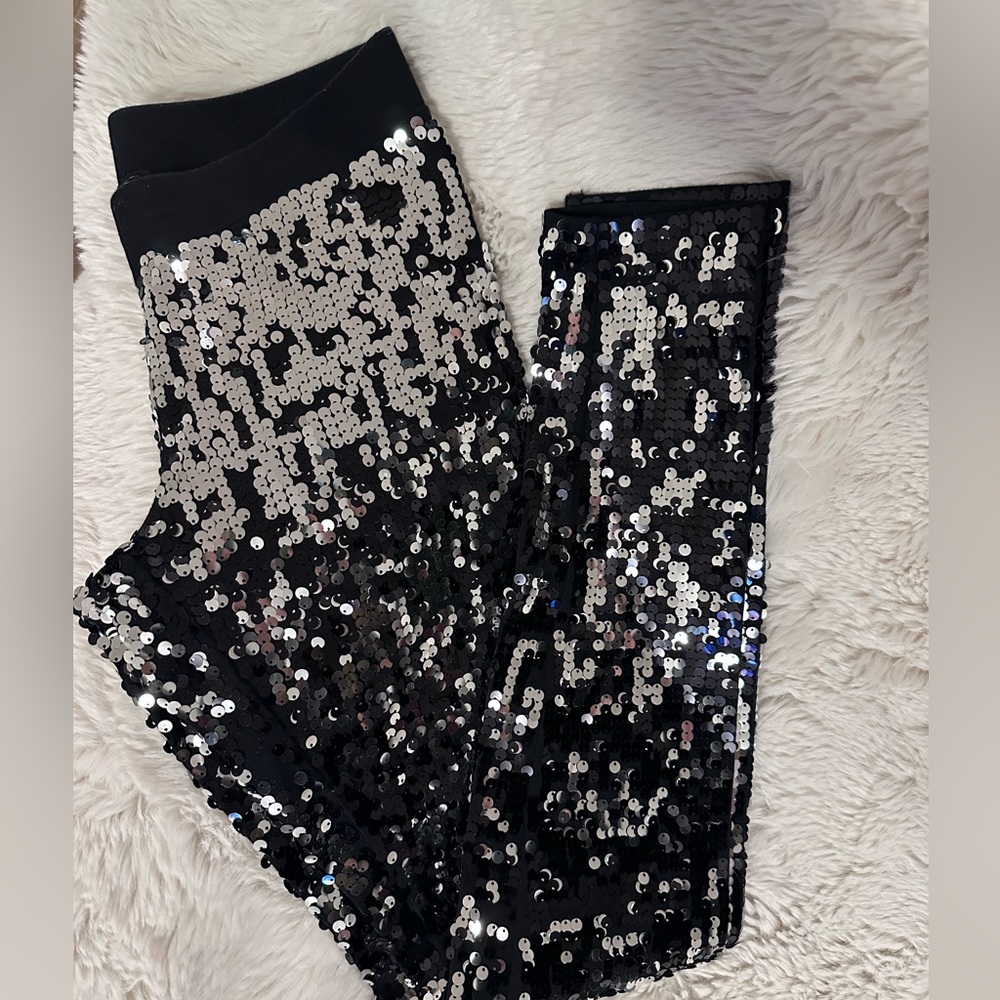 Express  black and silver sequin leggings size XS.